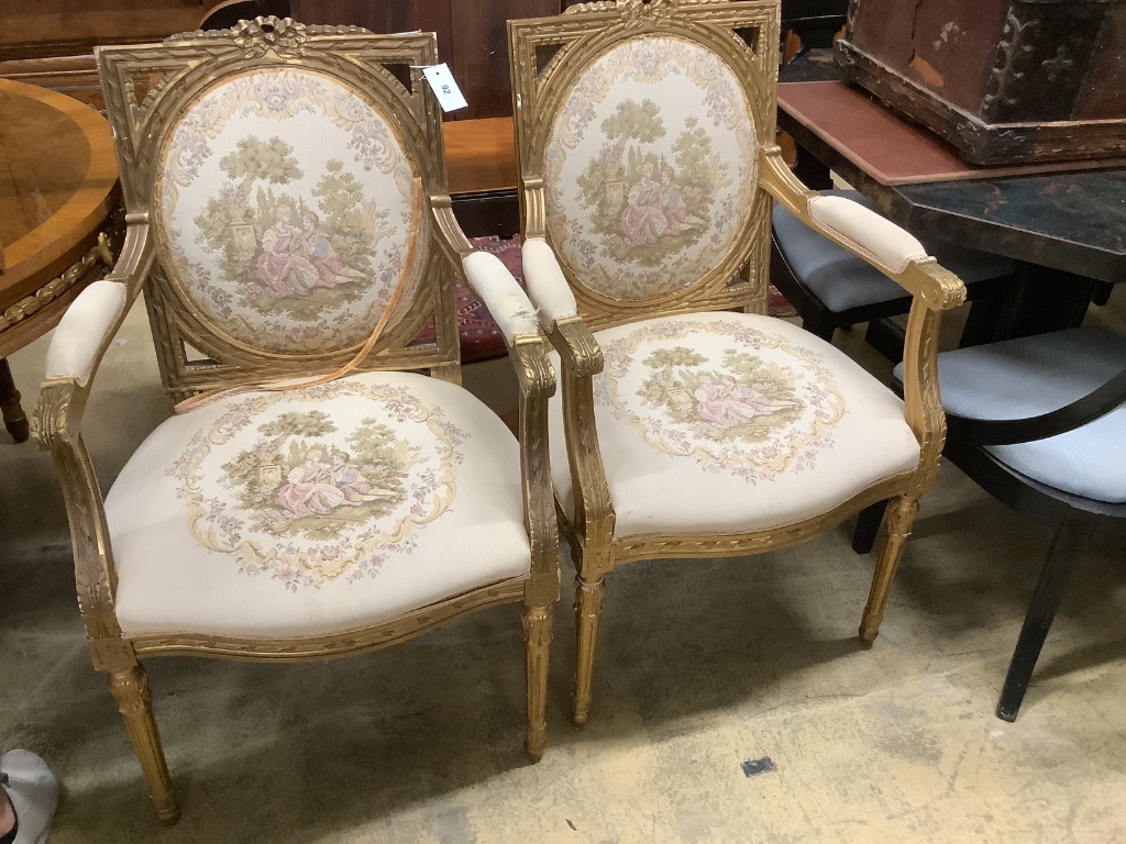 A set of six French giltwood and gesso tapestry back chairs (two with arms)